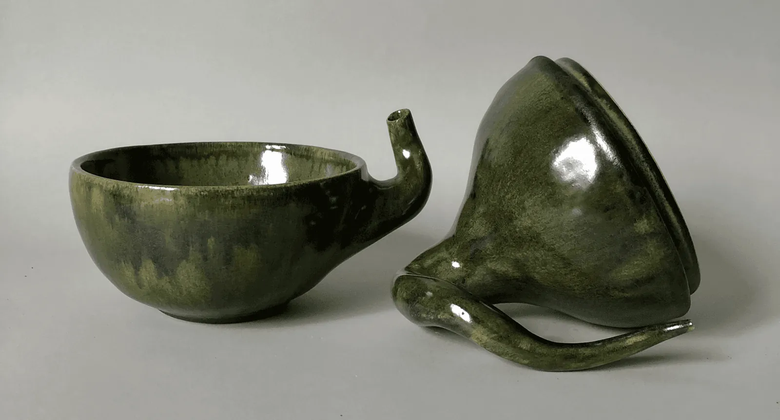 Cup and inverted pot side by side